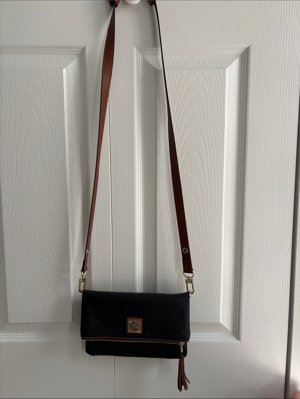 Dooney & Bourke Black Crossbody Bag with Brown Strap